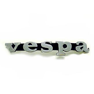 BADGE (EMBLEM) 'VESPA' LEGSHIELD PEEN-OUT PIN BADGE; 1973-1983 (CHROME VESPA W/ BLACK BACKGROUND) (152649) (194955)